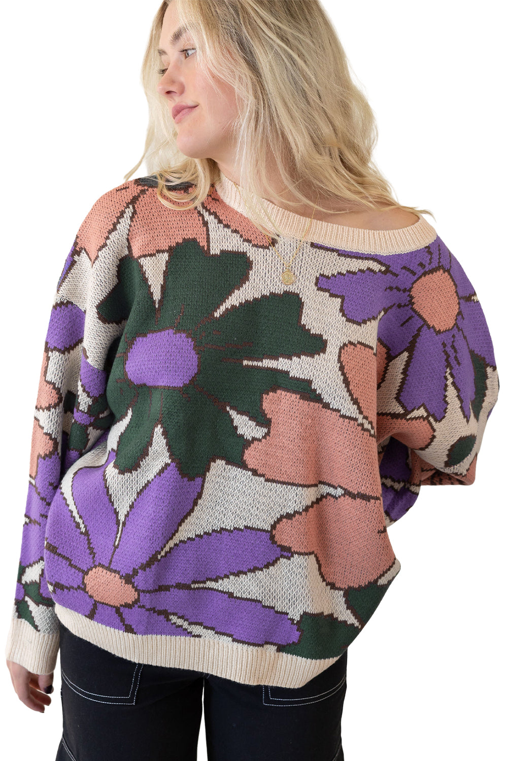 A cozy multicolour flower print loose sweater, featuring vibrant floral designs, perfect for chilly days.