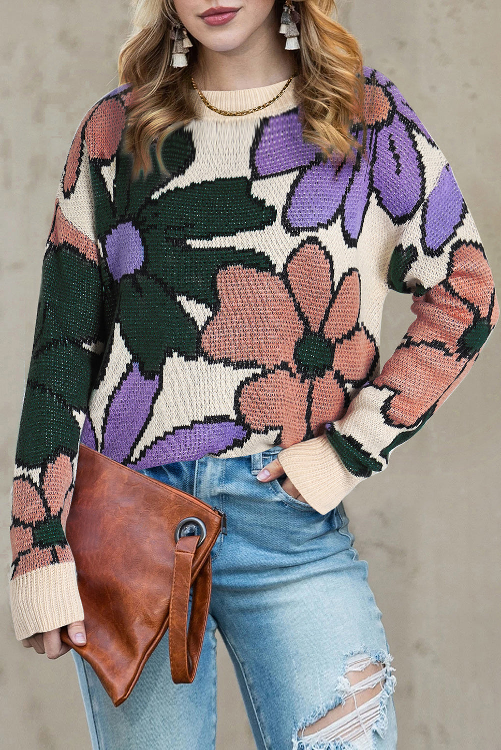 A cozy multicolour flower print loose sweater, featuring vibrant floral designs, perfect for chilly days.