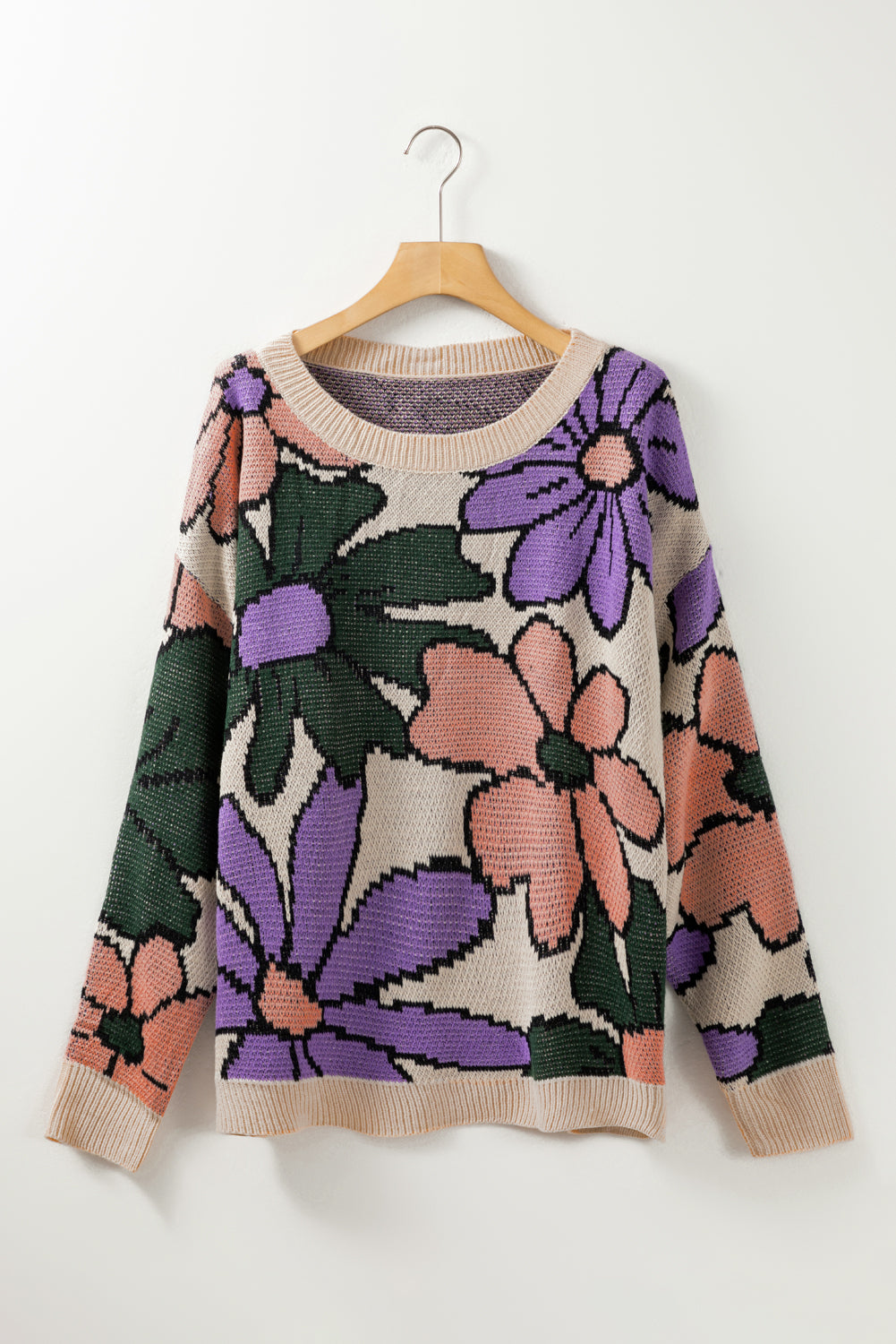 A cozy multicolour flower print loose sweater, featuring vibrant floral designs, perfect for chilly days.