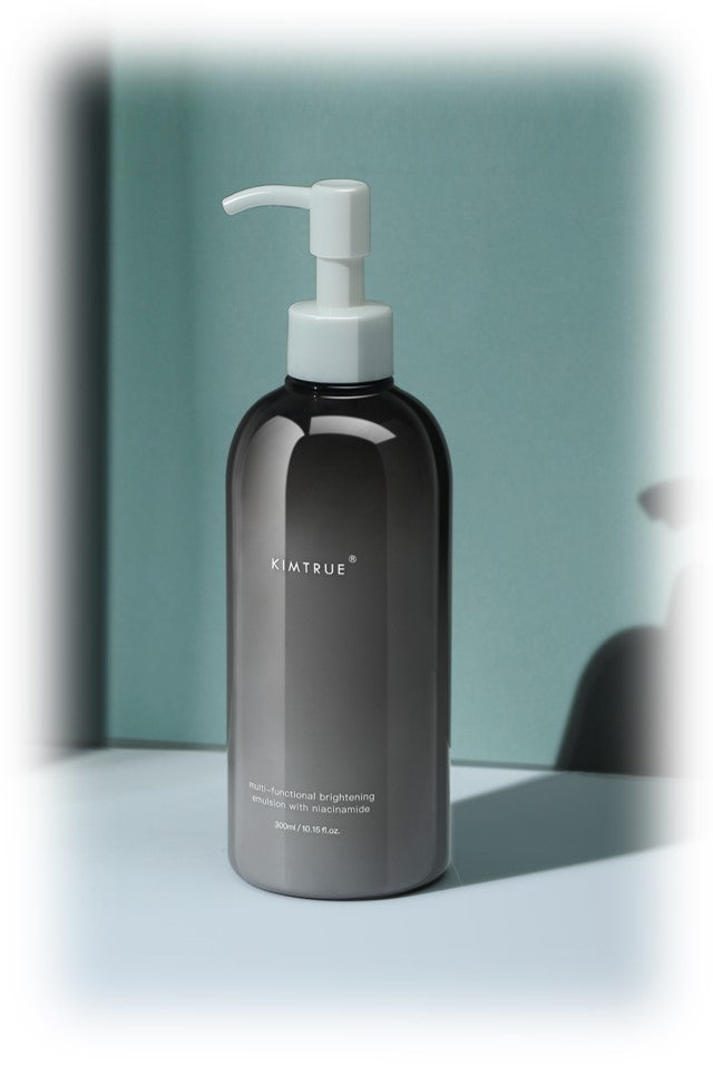 A bottle of Multi-Functional Brightening Emulsion with Niacinamide, showcasing its sleek design and vibrant packaging.