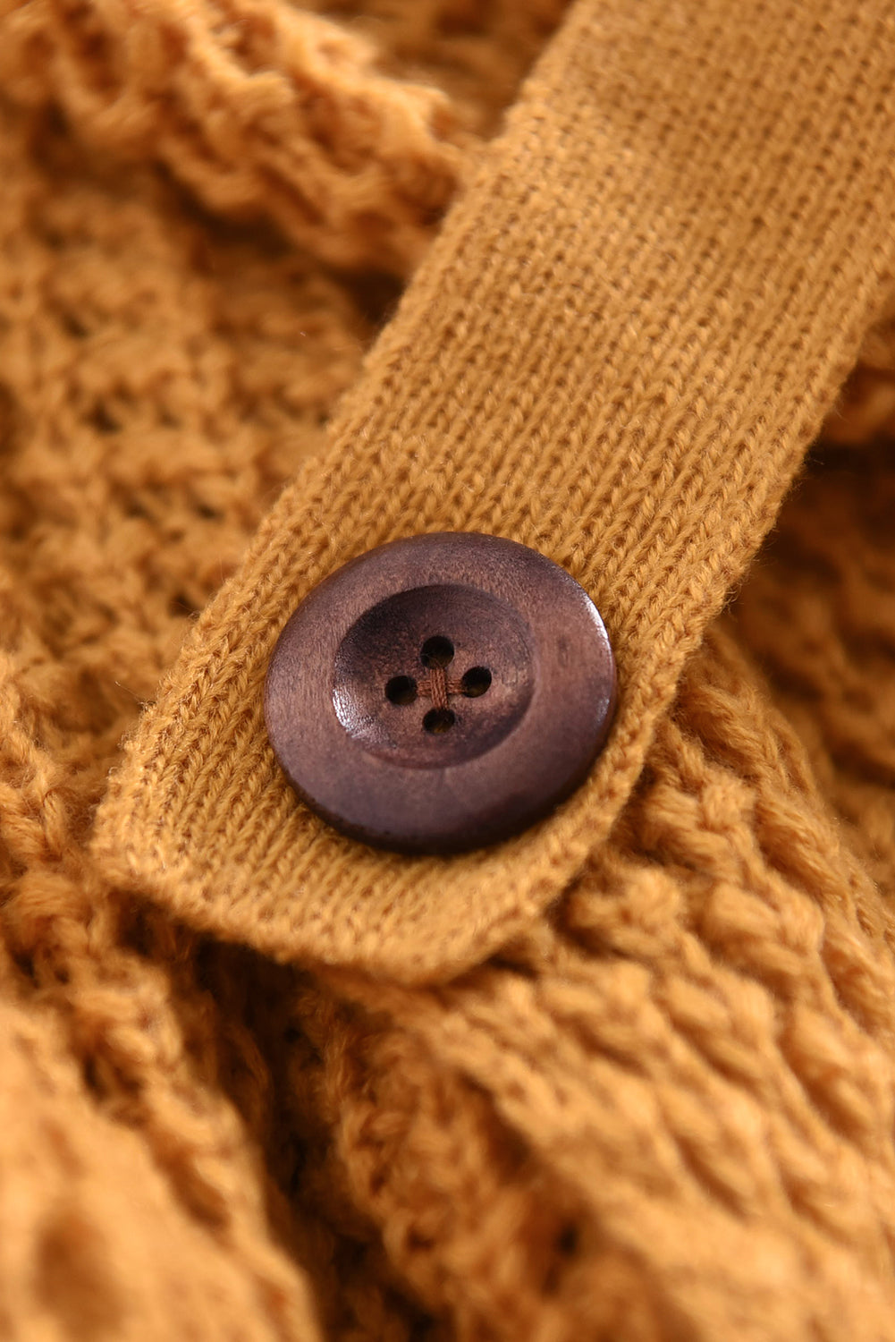 Mustard Buttoned Wrap Turtleneck Sweater featuring decorative buttons and asymmetric design, perfect for stylish layering.