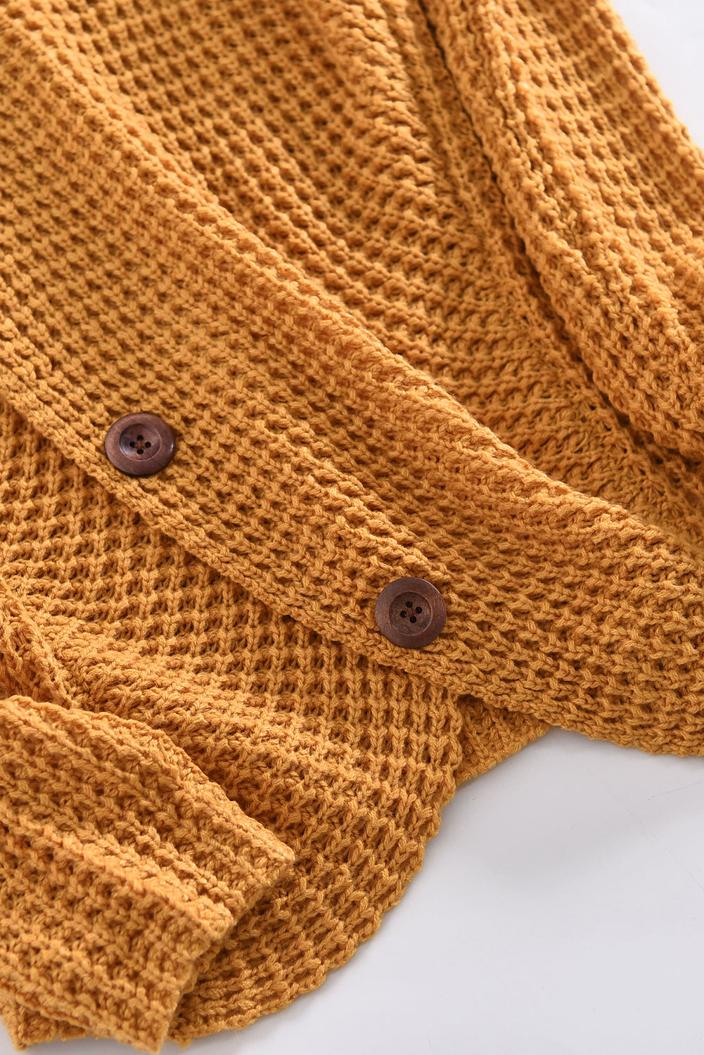 Mustard Buttoned Wrap Turtleneck Sweater featuring decorative buttons and asymmetric design, perfect for stylish layering.