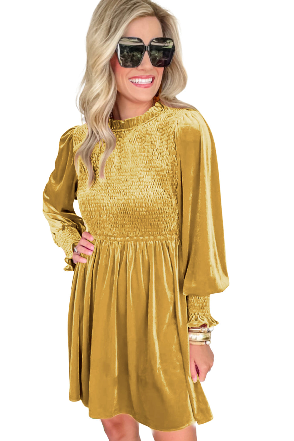 Mustard velvet dress featuring a frilled neck and smocked bodice, elegantly flowing skirt, perfect for special occasions.