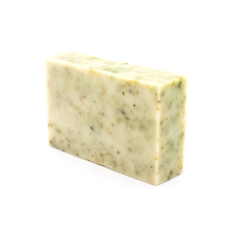 Naked Soap Organic Soap 90g with nettles, showcasing its natural ingredients and green flecks.