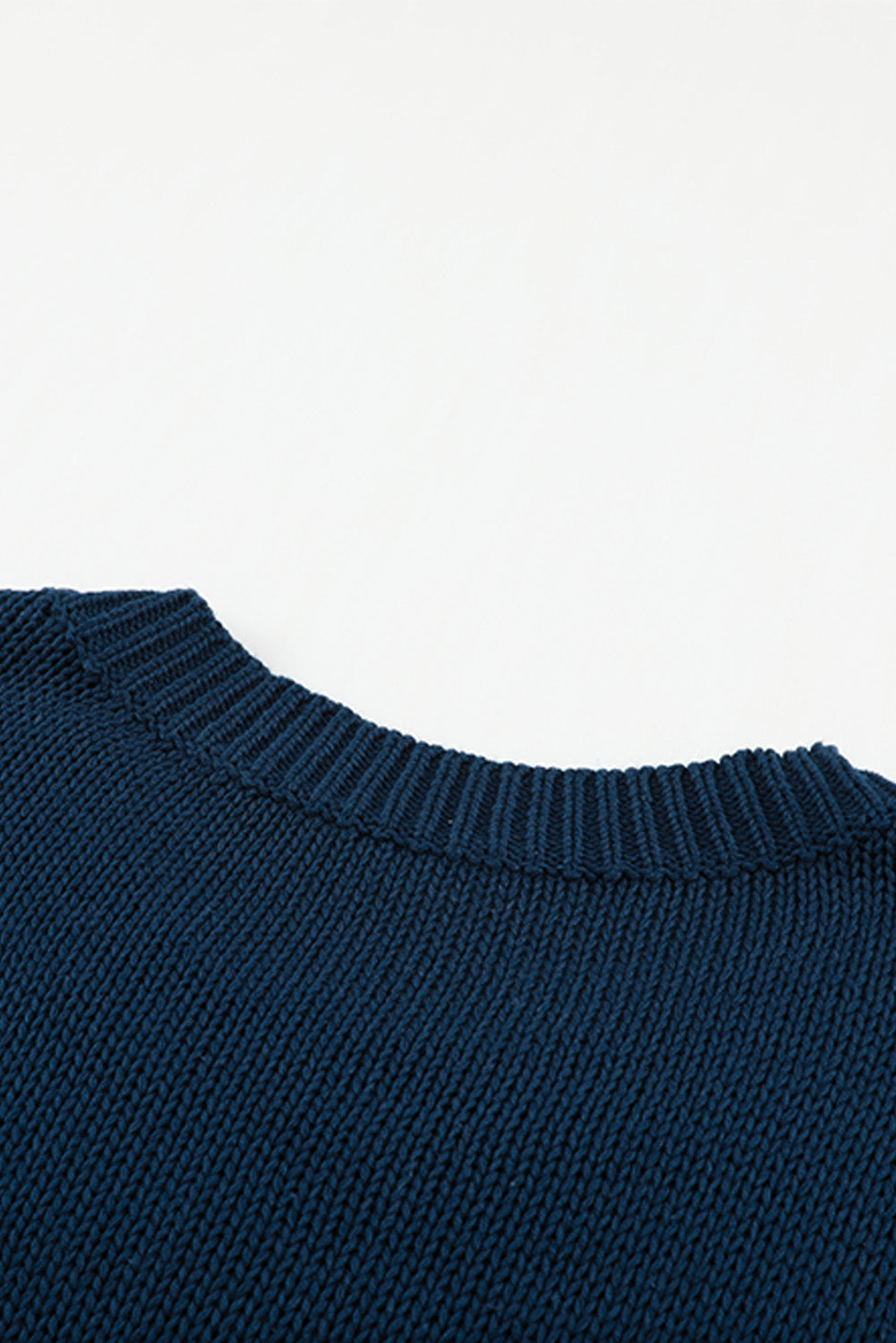 A cozy navy long sleeves turtleneck sweater displayed on a mannequin, showcasing its soft fabric and elegant design.