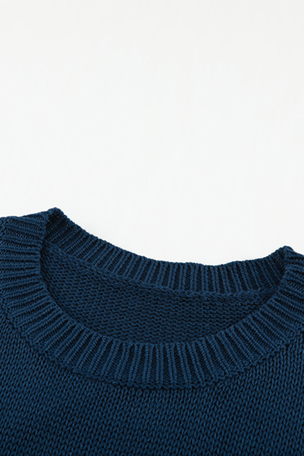 A cozy navy long sleeves turtleneck sweater displayed on a mannequin, showcasing its soft fabric and elegant design.