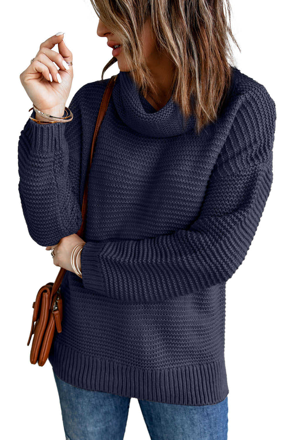 A cozy navy long sleeves turtleneck sweater displayed on a mannequin, showcasing its soft fabric and elegant design.