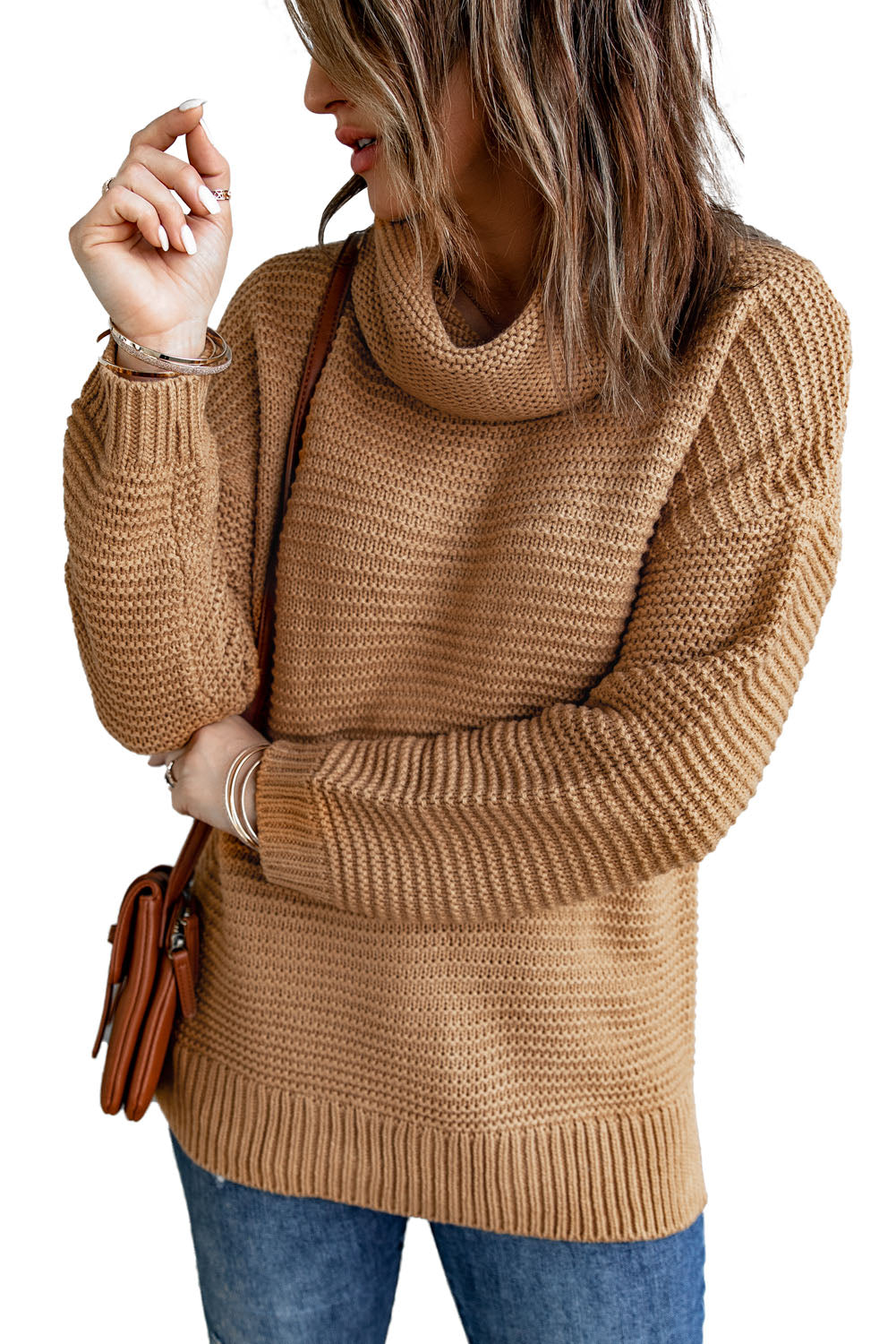 A cozy navy long sleeves turtleneck sweater displayed on a mannequin, showcasing its soft fabric and elegant design.