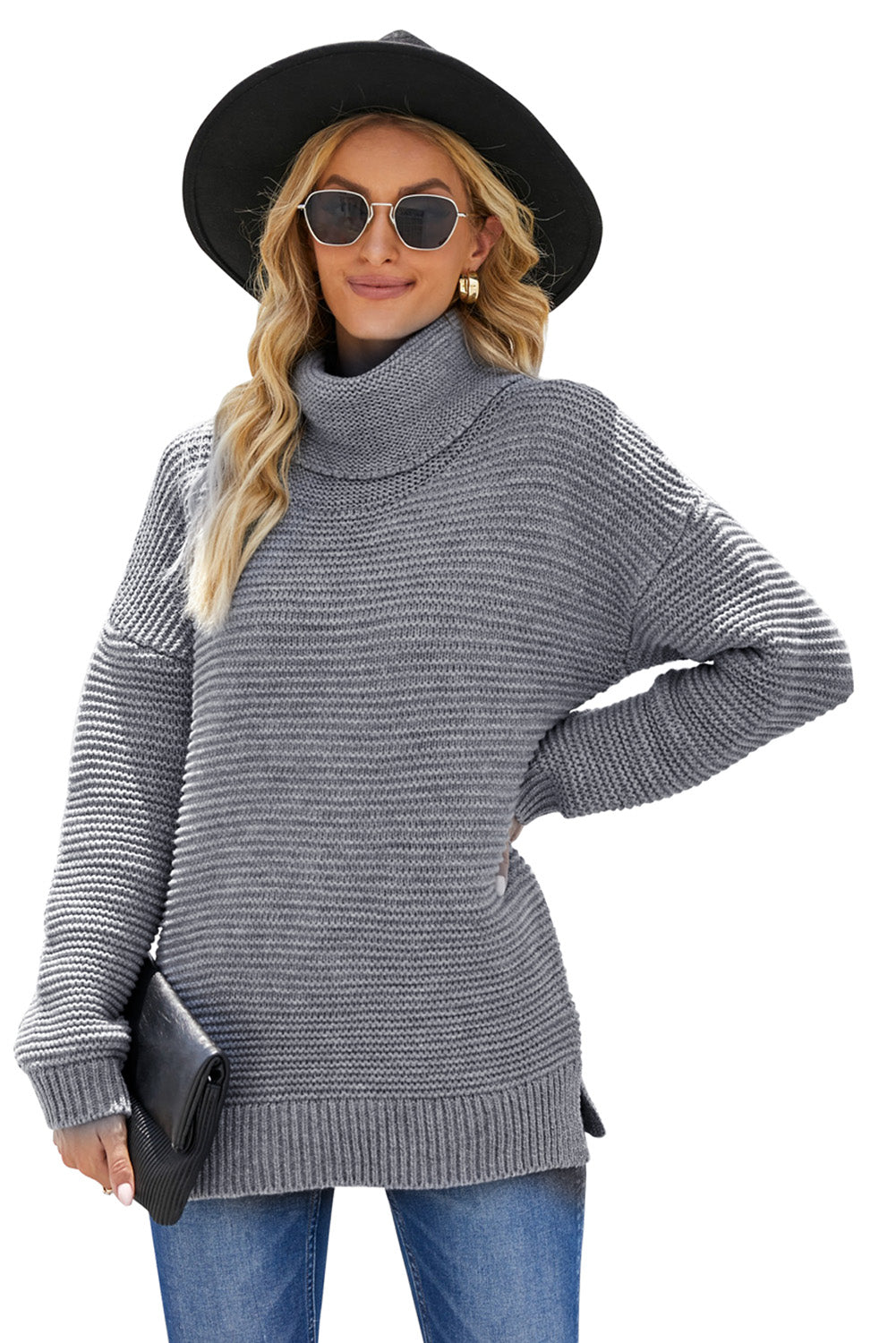 A cozy navy long sleeves turtleneck sweater displayed on a mannequin, showcasing its soft fabric and elegant design.