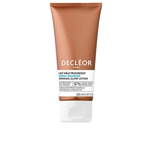 Decléor Neroli Bigarade Self-Tanning Gradual Glow Body Lotion bottle with a vibrant design, showcasing its luxurious formula.