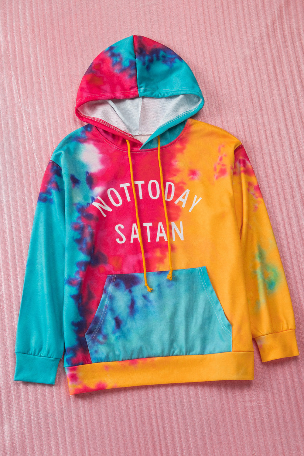 A colorful tie-dye hoodie featuring the phrase 'Not Today Satan' in white text, showcasing a unique blend of vibrant colors.