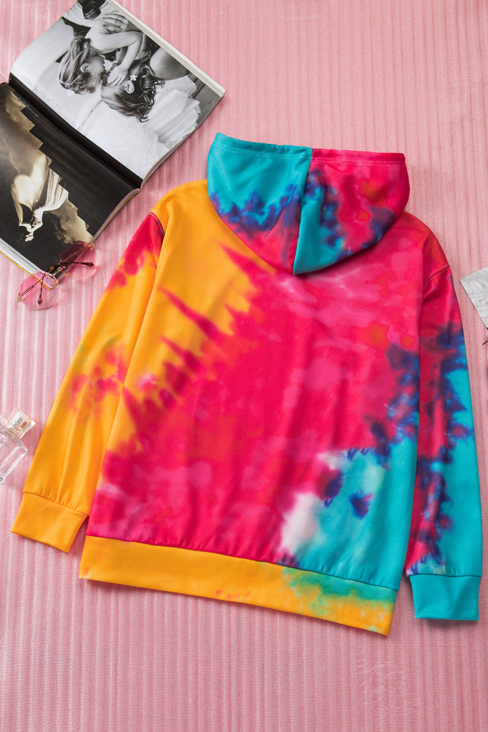 A colorful tie-dye hoodie featuring the phrase 'Not Today Satan' in white text, showcasing a unique blend of vibrant colors.