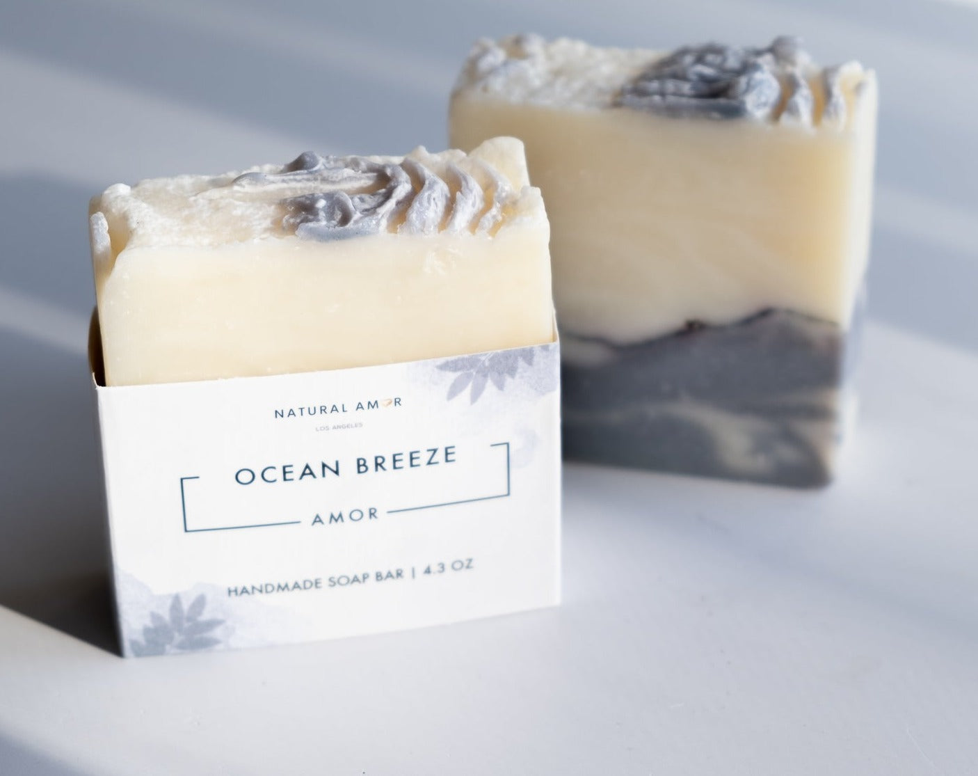 Ocean Breeze Soap Bar with natural indigo powder and kaolin clay, featuring a refreshing scent of peppermint, lavender, and lime.