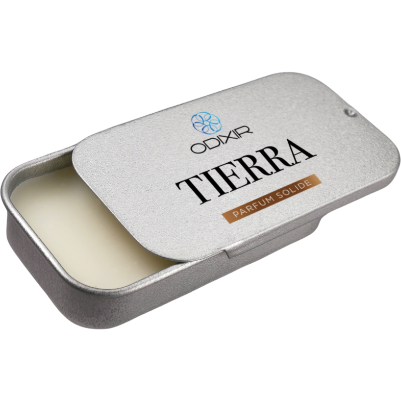 ODIXIR™ Parfum Solide Tierra solid perfume in an elegant case, showcasing its natural ingredients and luxurious design.