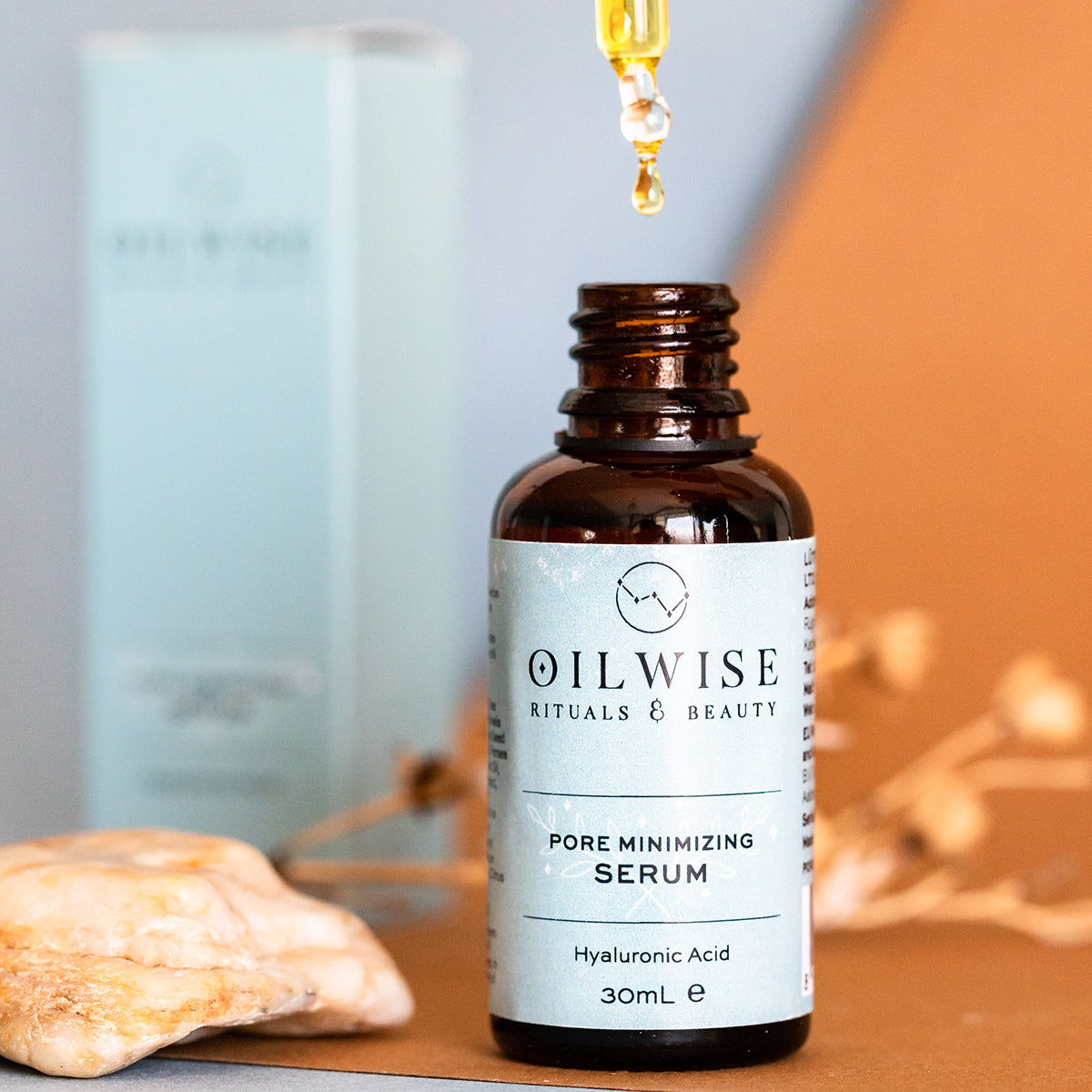 Oilwise Pore Minimizing Serum in a 30 ml bottle, featuring a sleek design and a dropper for easy application.