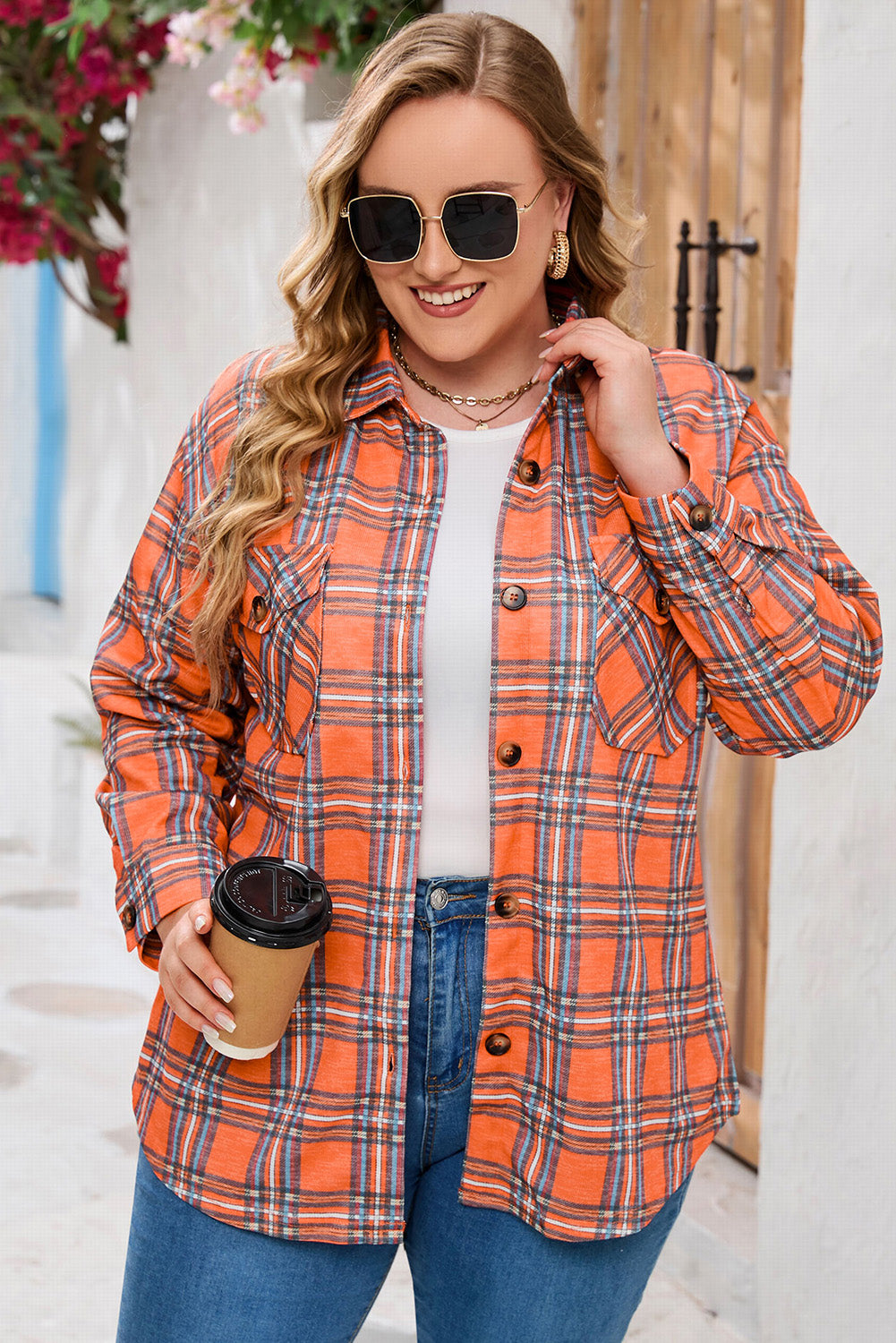 Orange plus size plaid long sleeve shirt with chest pockets and button-up front, perfect for casual wear.