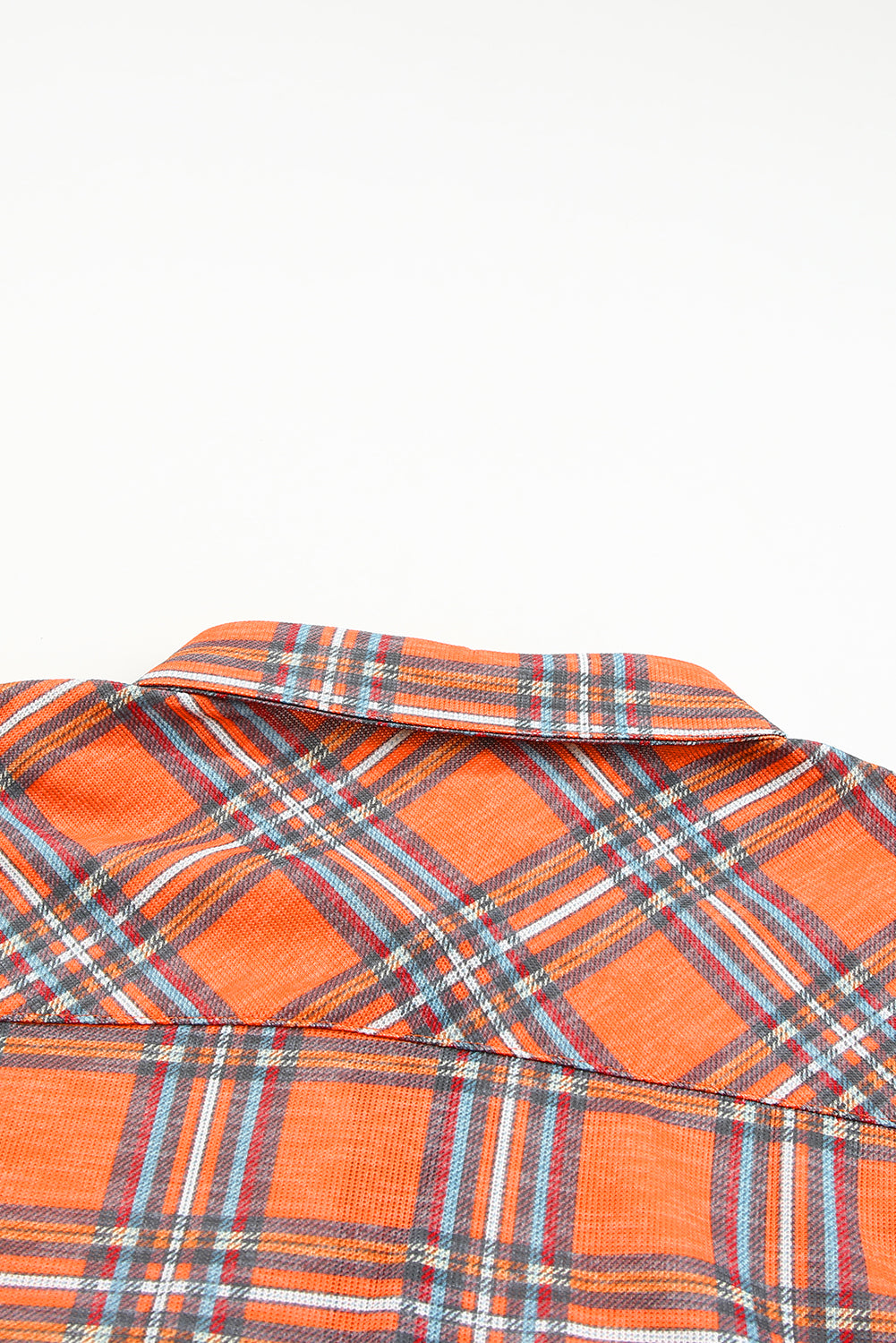 Orange plus size plaid long sleeve shirt with chest pockets and button-up front, perfect for casual wear.