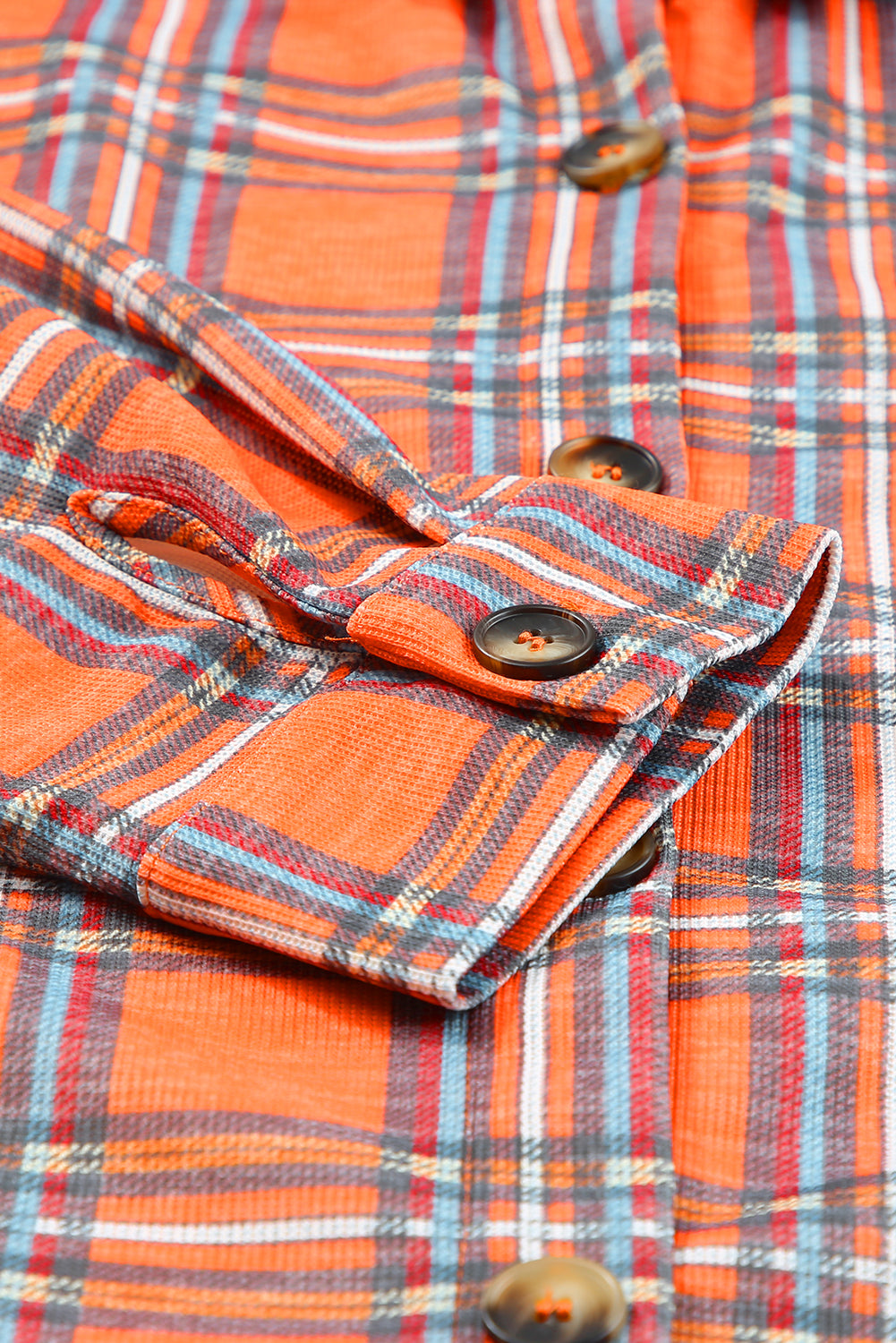 Orange plus size plaid long sleeve shirt with chest pockets and button-up front, perfect for casual wear.