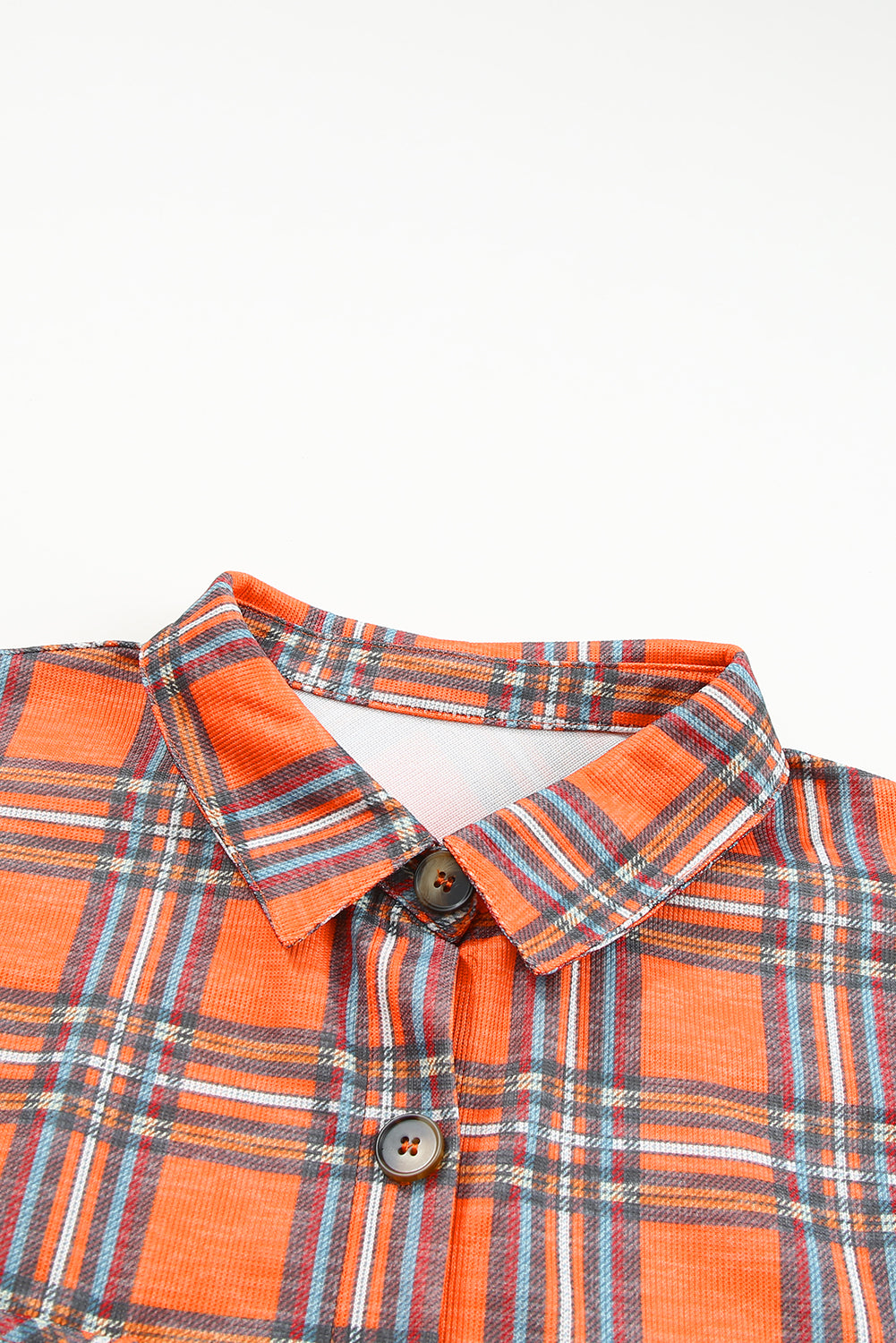 Orange plus size plaid long sleeve shirt with chest pockets and button-up front, perfect for casual wear.