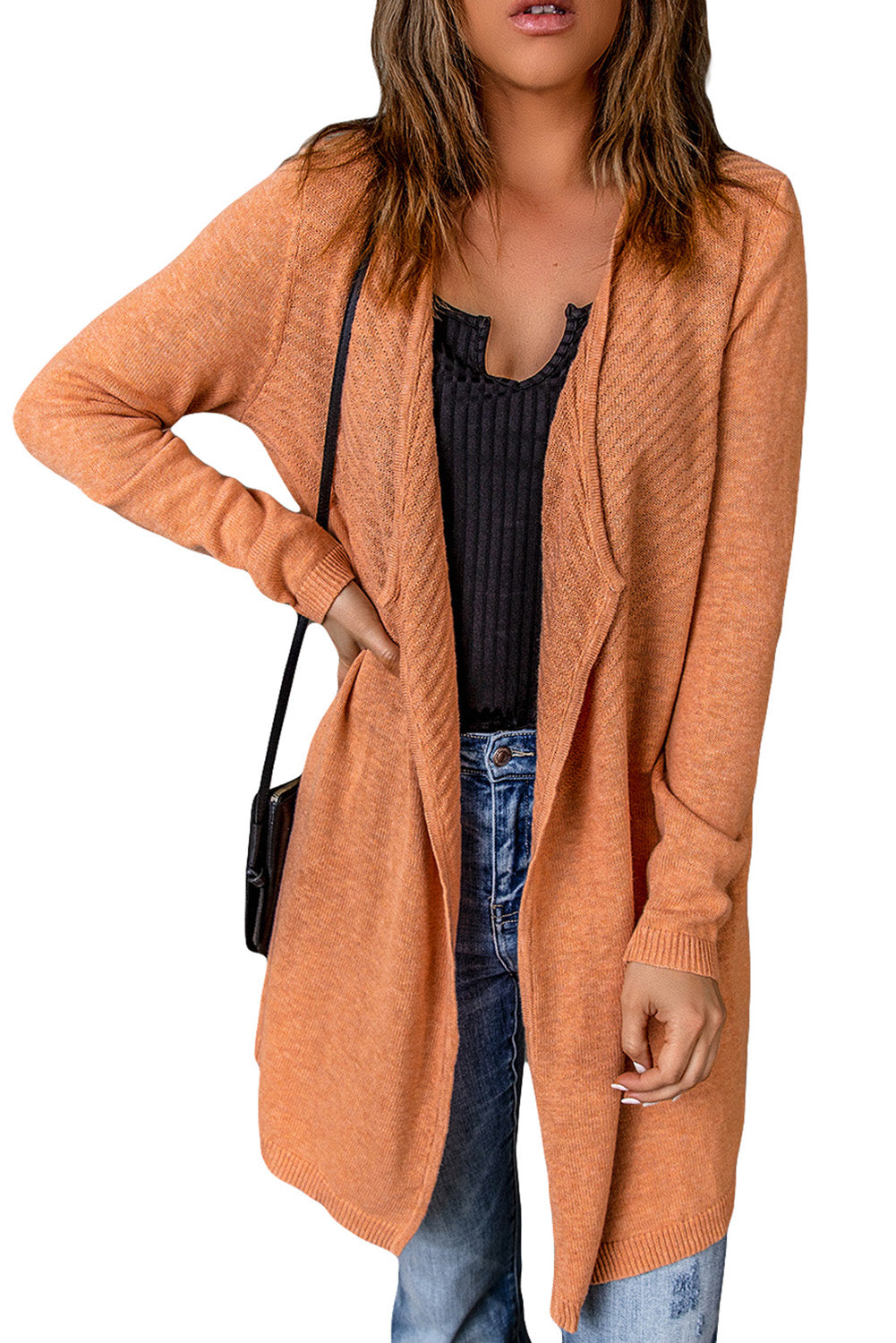 A vibrant orange ribbed open front knit cardigan displayed on a mannequin, showcasing its long sleeves and casual style.