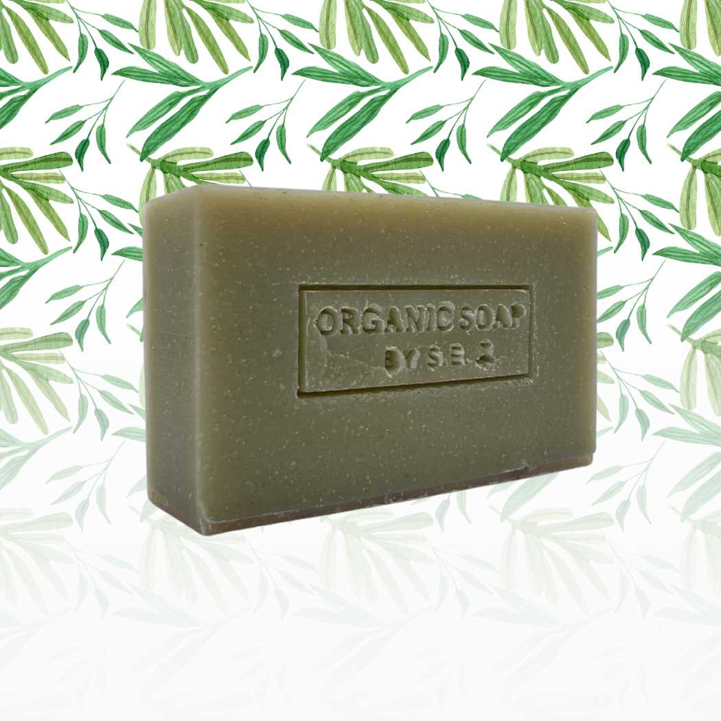 A collection of organic bar soaps in various scents, showcasing their natural ingredients and eco-friendly packaging.