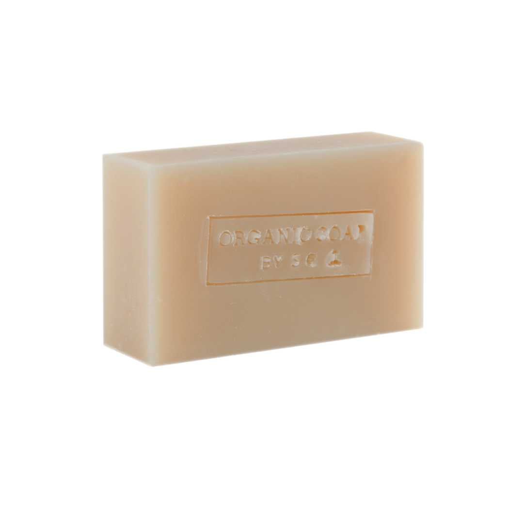 A collection of organic bar soaps in various scents, showcasing their natural ingredients and eco-friendly packaging.