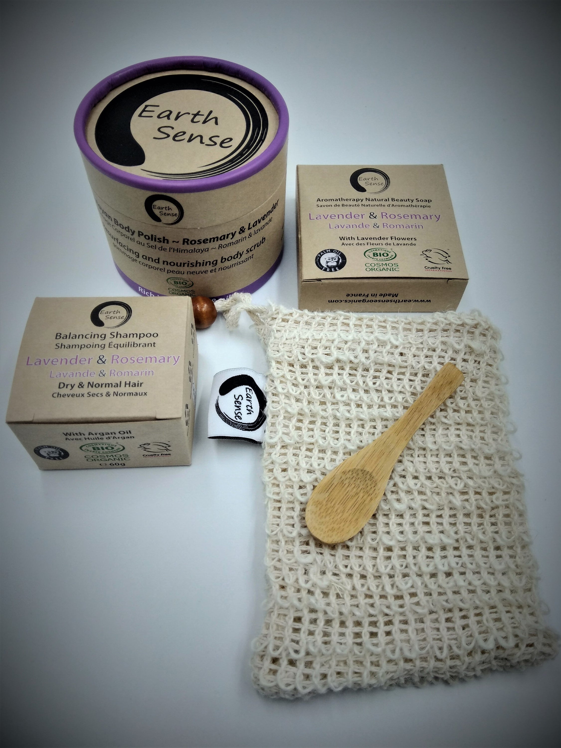 Organic Certified Solid Soap in Lavender & Rosemary, showcasing its natural ingredients and beautiful lavender flowers.