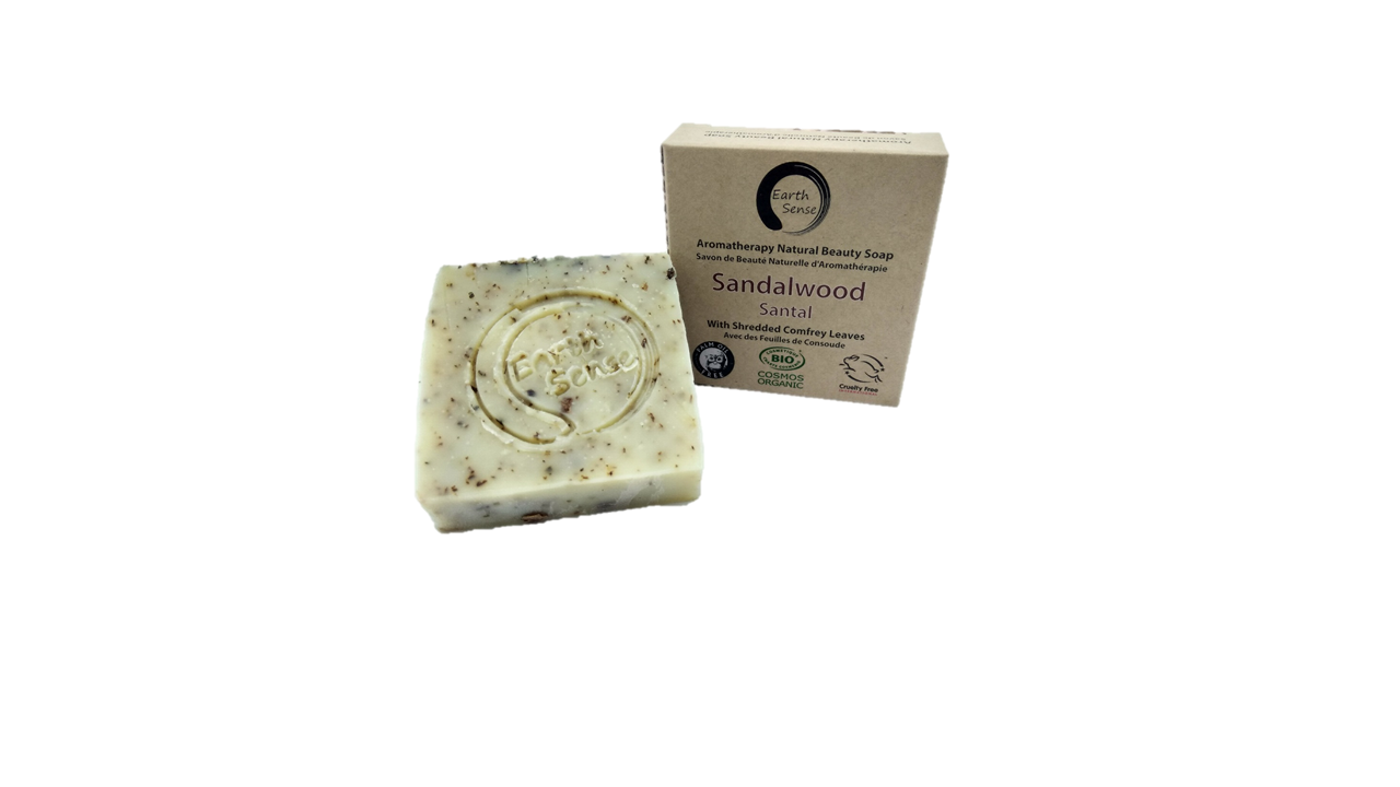 Organic Certified Solid Soap with Sandalwood and Shredded Comfrey Leaves, showcasing its natural ingredients and eco-friendly packaging.