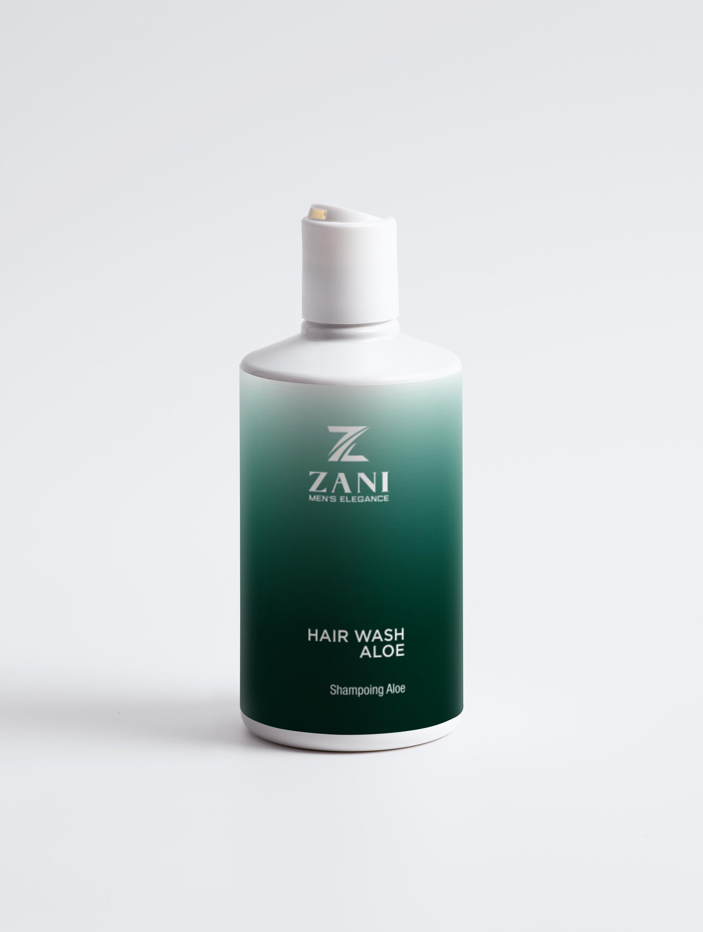 A bottle of Elite Hair Wash Aloe, a luxurious men's shampoo with aloe vera and green tea extract, designed for hydration and protection.