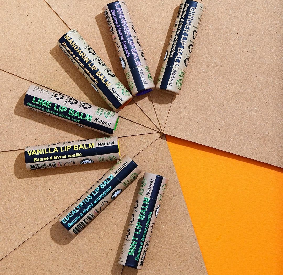 Organic Mandarin Lip Balm in a paper tube, showcasing its natural ingredients and eco-friendly packaging.