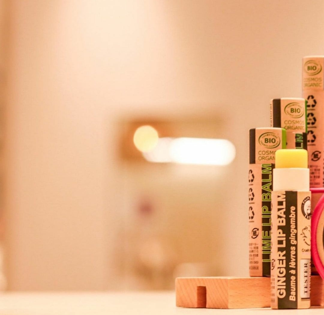 Organic Mandarin Lip Balm in a paper tube, showcasing its natural ingredients and eco-friendly packaging.