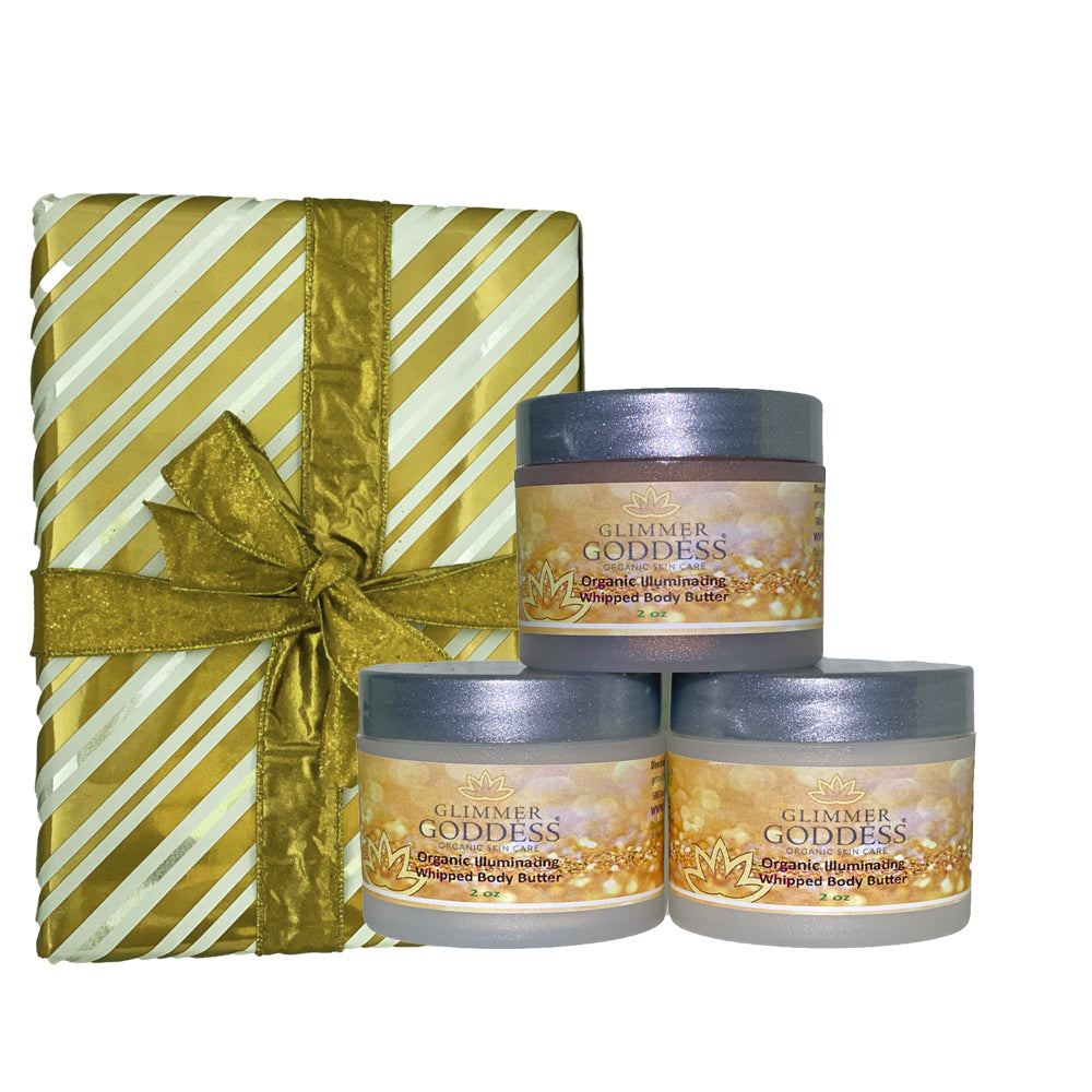 Three 2 oz jars of Organic Shimmering Whipped Body Butter in bronze, gold, and rose gold shimmer, showcasing a luxurious travel set.