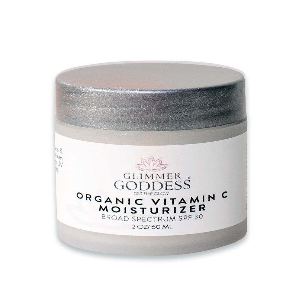 Organic Vitamin C Face Cream SPF 30 in a sleek jar, showcasing its rich texture and natural ingredients.