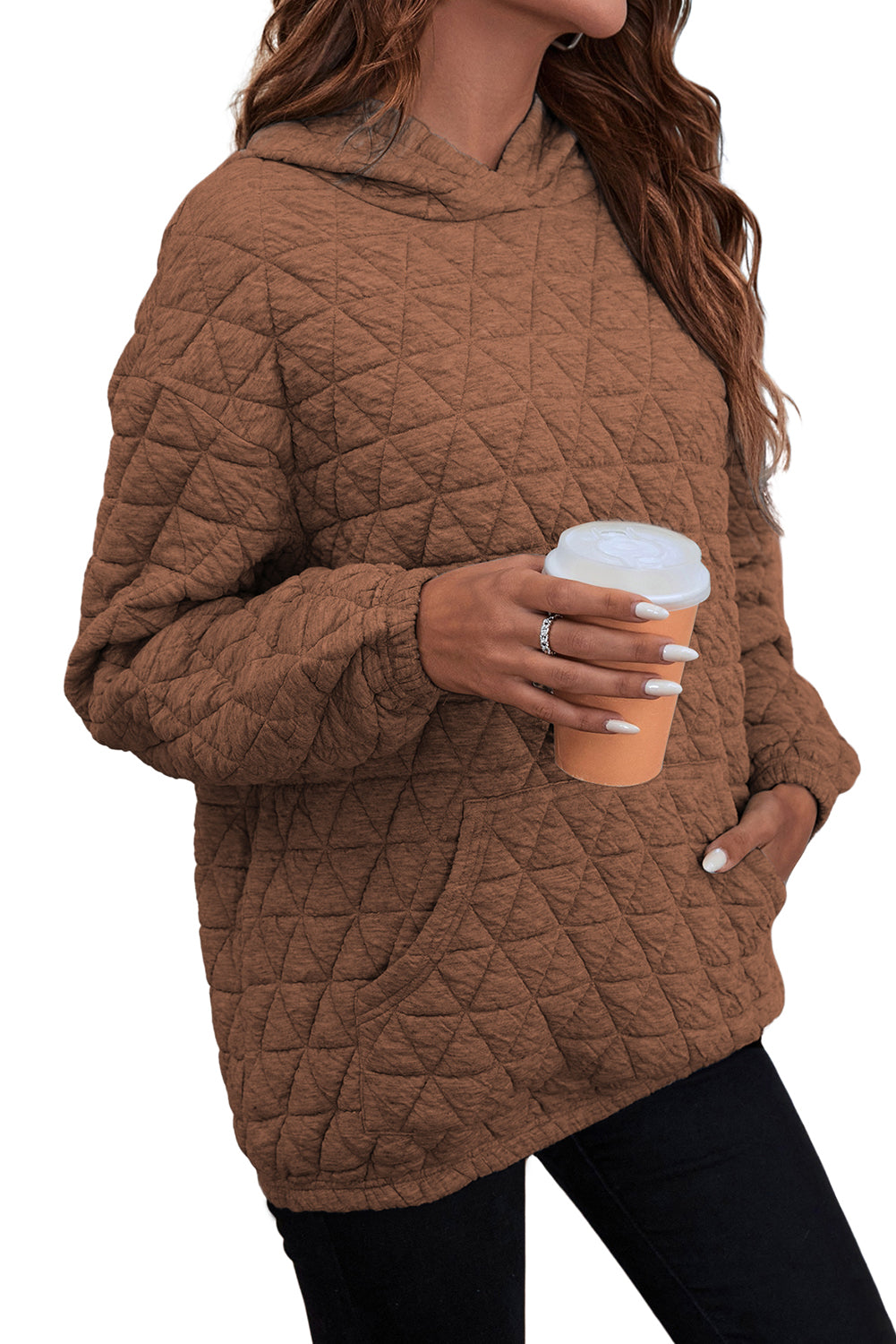 Pale khaki solid color quilted kangaroo pocket hoodie displayed on a mannequin, showcasing its stylish design and functional features.