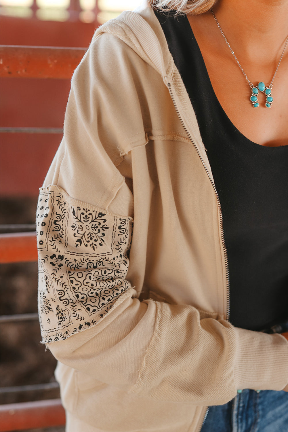 Parchment Printed Patchwork Hooded Jacket featuring a vintage paisley print, zip-up design, and a cozy hood for warmth.