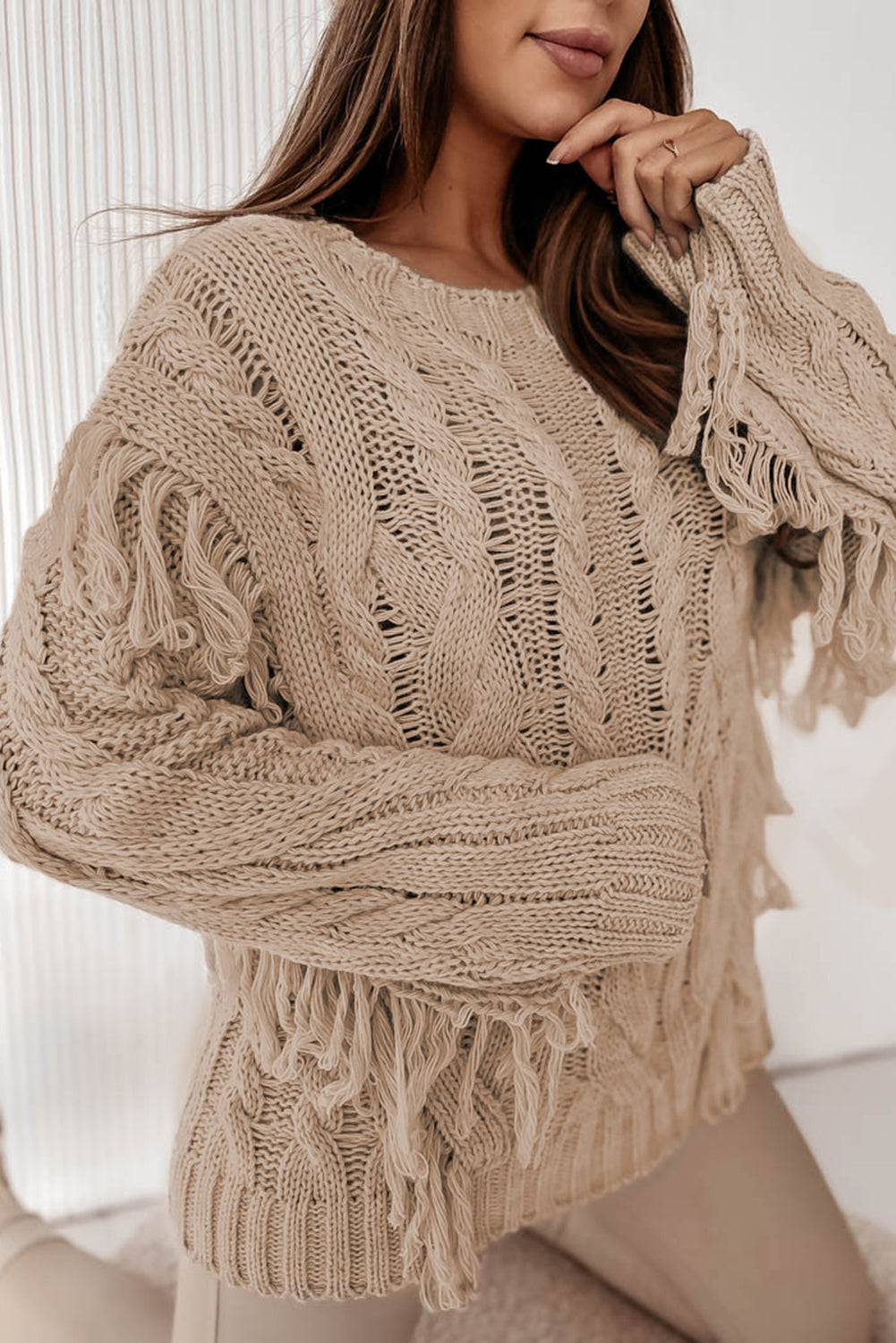 Parchment Tasseled Braided Knit Sweater featuring elegant tassels and braided knit design, perfect for winter fashion.