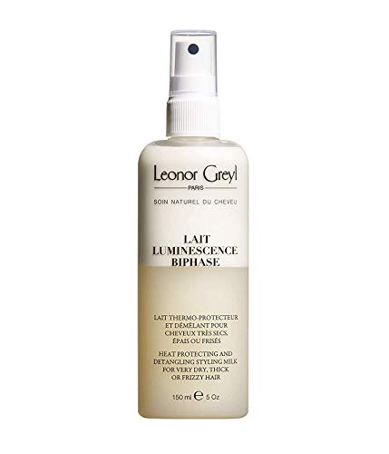 Leonor Greyl Paris Lait Luminescence Detangling Milk Spray bottle with a sleek design, showcasing its luxurious hair care formula.