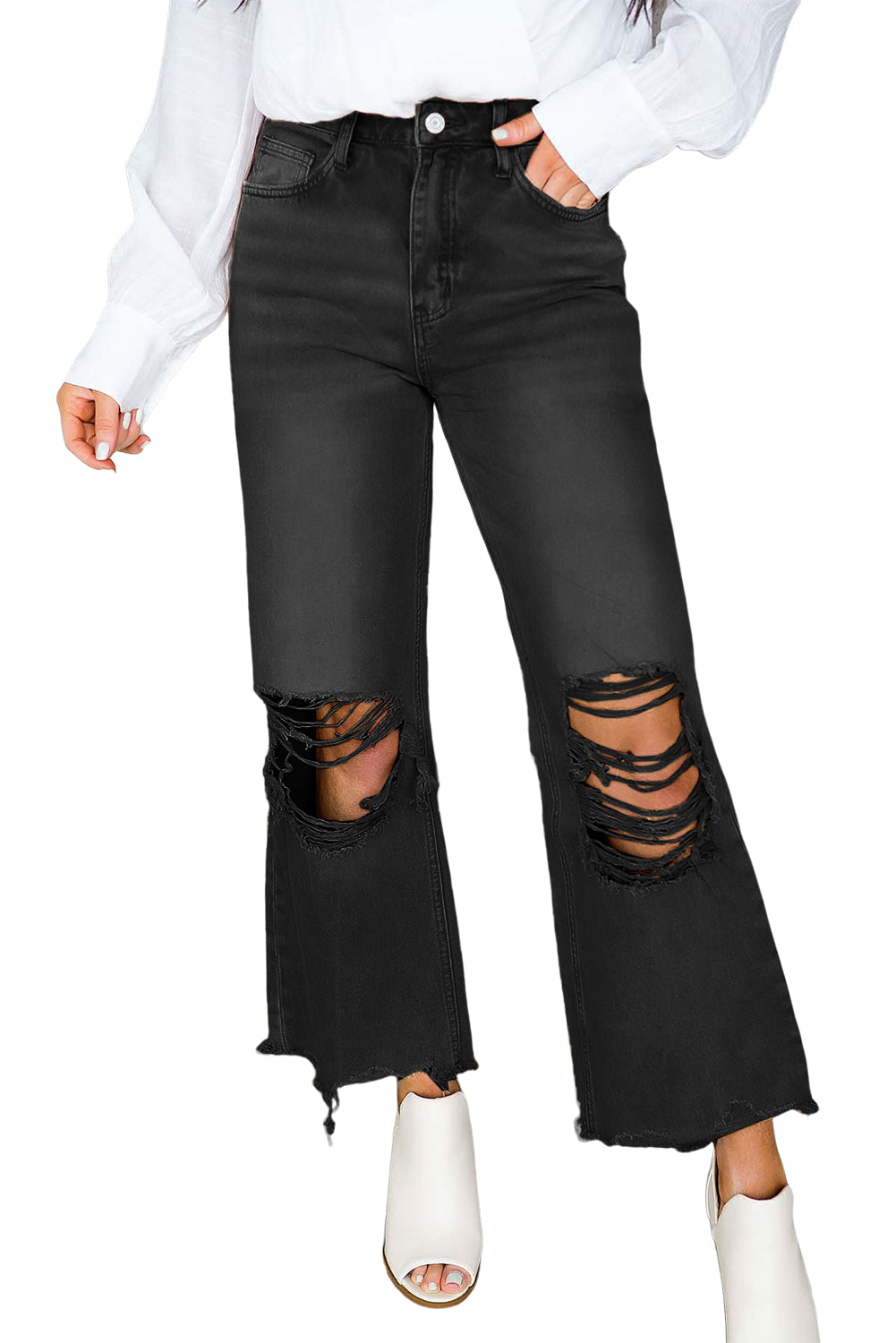 A pair of Peach Blossom Distressed Hollow-out High Waist Cropped Flare Jeans showcasing a vintage style with unique distressed details.