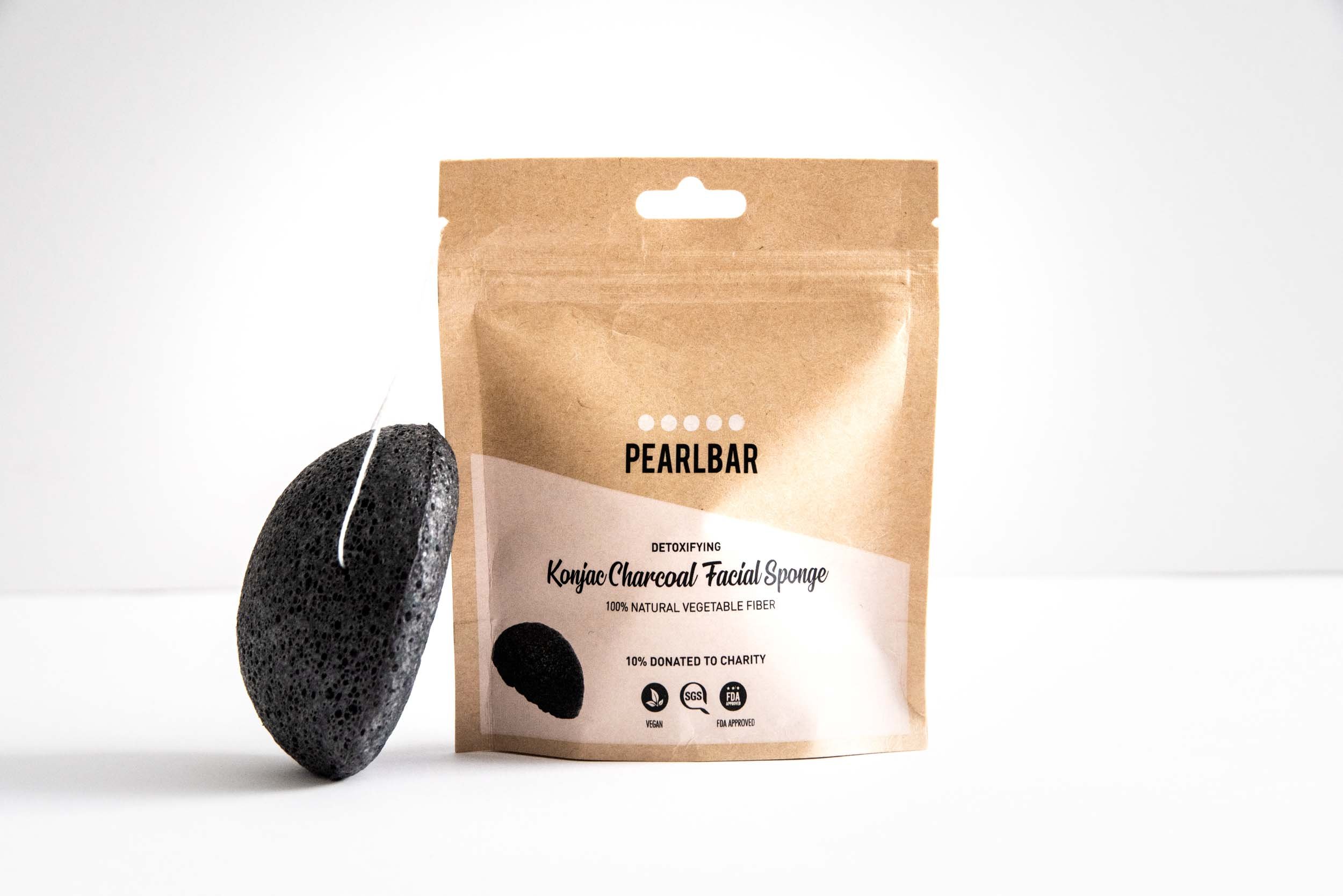 PearlBar Konjac & Charcoal Detoxifying Facial Sponge, a natural cleansing tool for deep exfoliation and detoxification of the skin.