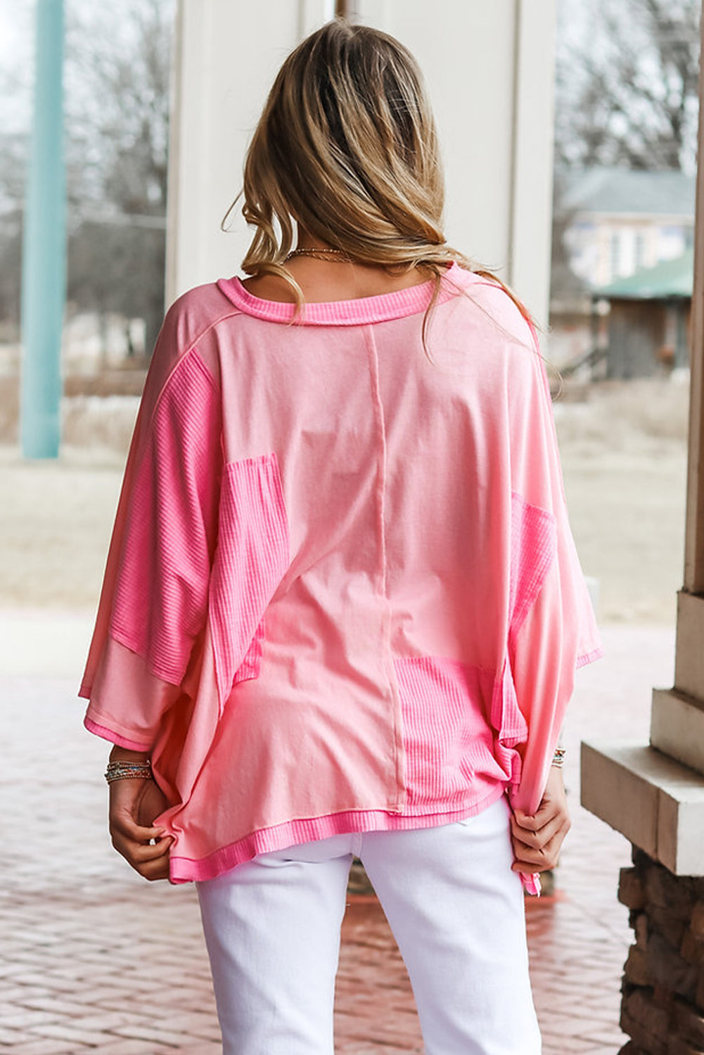 A stylish pink color block patchwork top with 3/4 sleeves, featuring a loose fit design suitable for casual wear.