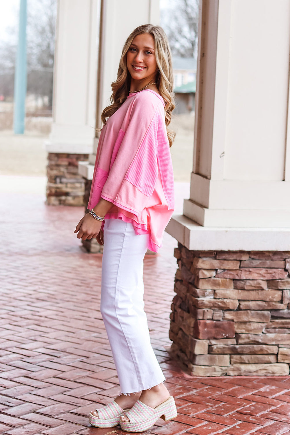 A stylish pink color block patchwork top with 3/4 sleeves, featuring a loose fit design suitable for casual wear.