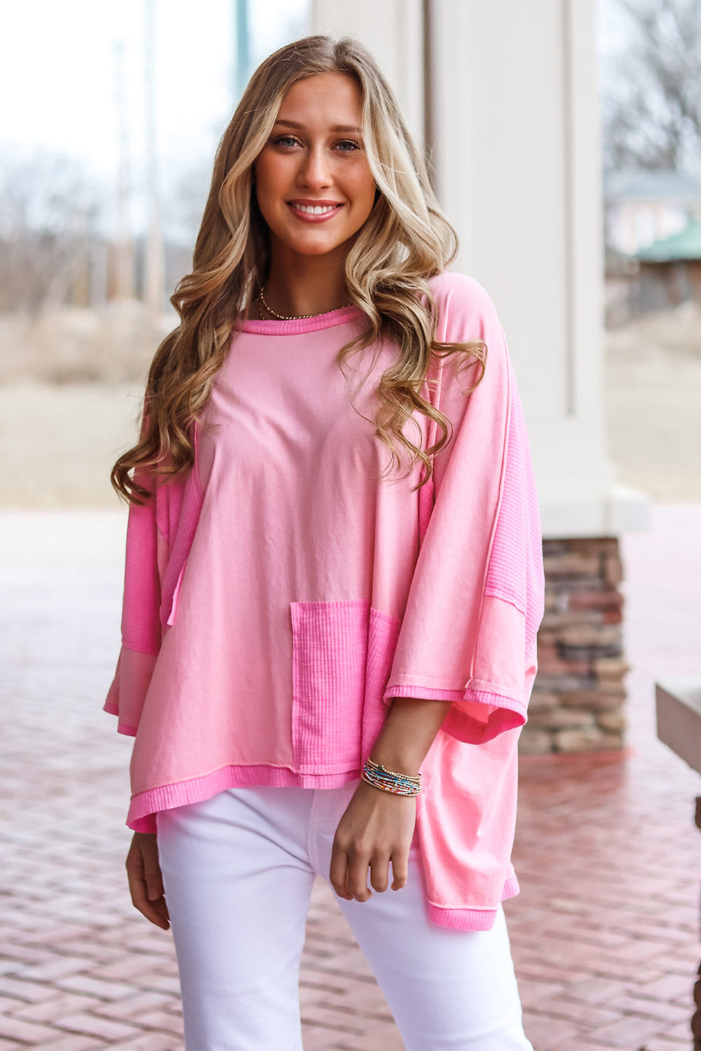 A stylish pink color block patchwork top with 3/4 sleeves, featuring a loose fit design suitable for casual wear.