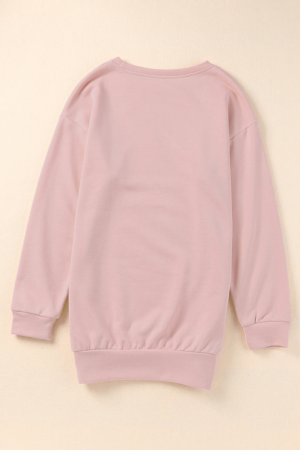 A stylish pink crew neck sweatshirt featuring slit buttons, designed for comfort and a relaxed fit, suitable for all body types.