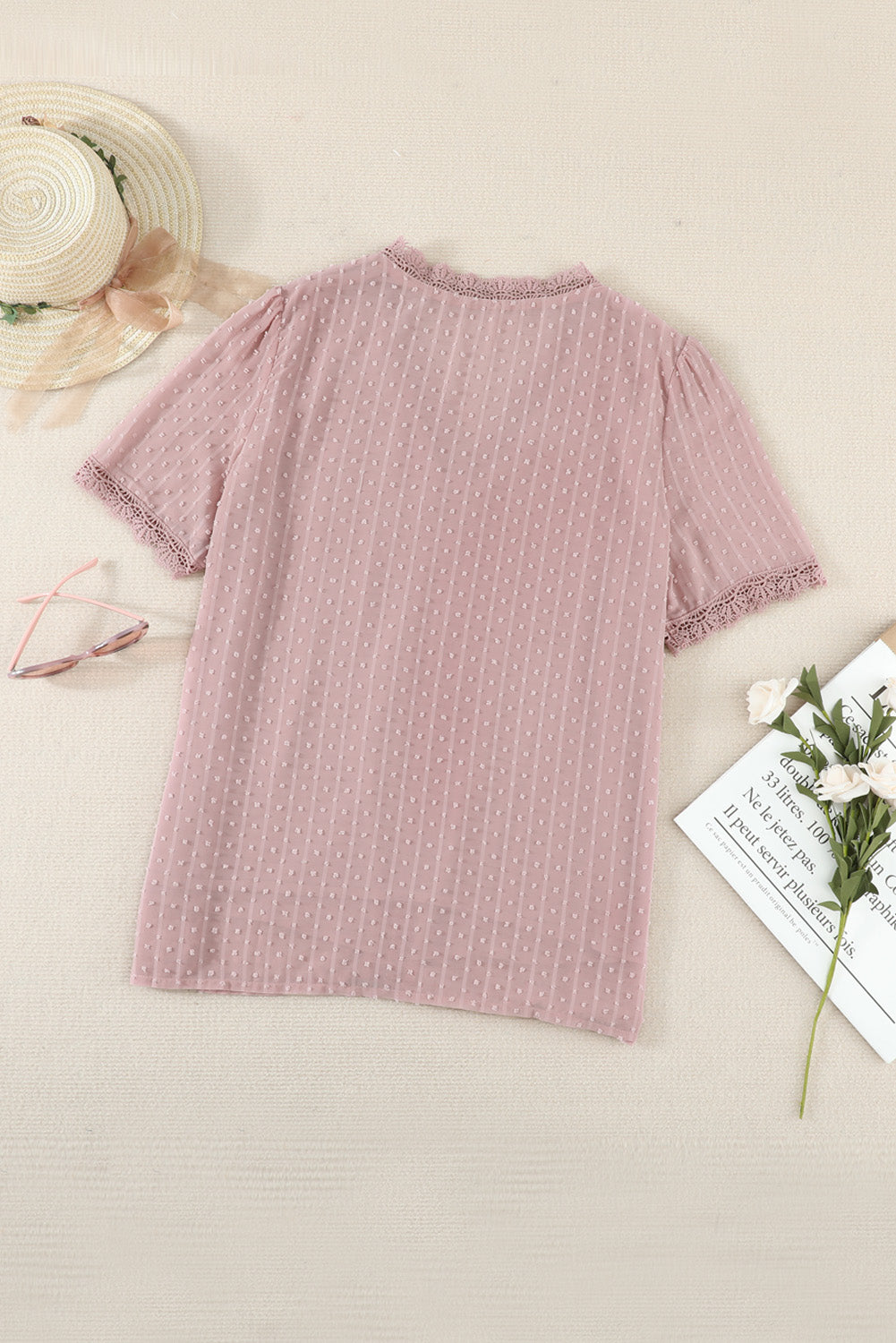 A stylish Pink Lace Splicing V-Neck Swiss Dot Short Sleeve Top featuring lace trim and a deep V-neck design, perfect for casual and formal occasions.