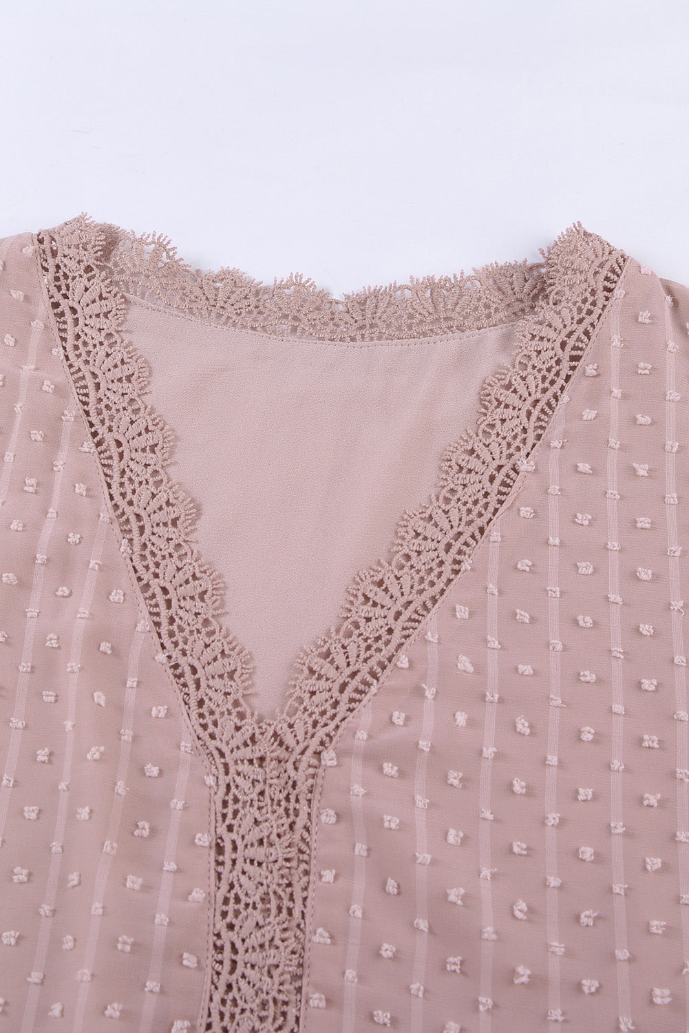 A stylish Pink Lace Splicing V-Neck Swiss Dot Short Sleeve Top featuring lace trim and a deep V-neck design, perfect for casual and formal occasions.