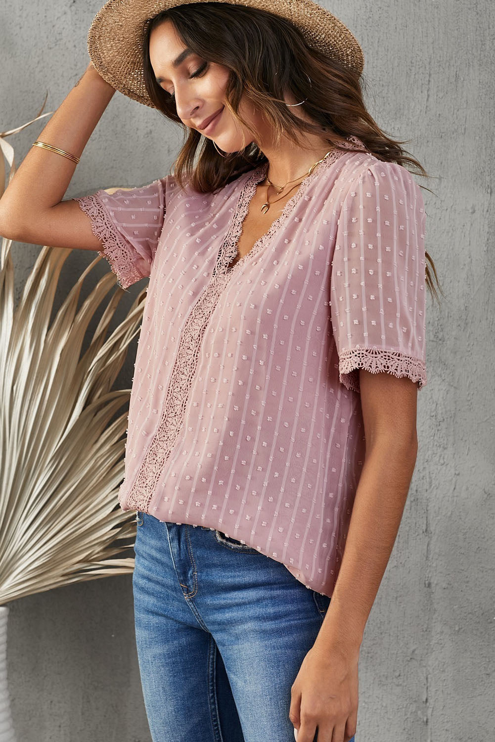 A stylish Pink Lace Splicing V-Neck Swiss Dot Short Sleeve Top featuring lace trim and a deep V-neck design, perfect for casual and formal occasions.