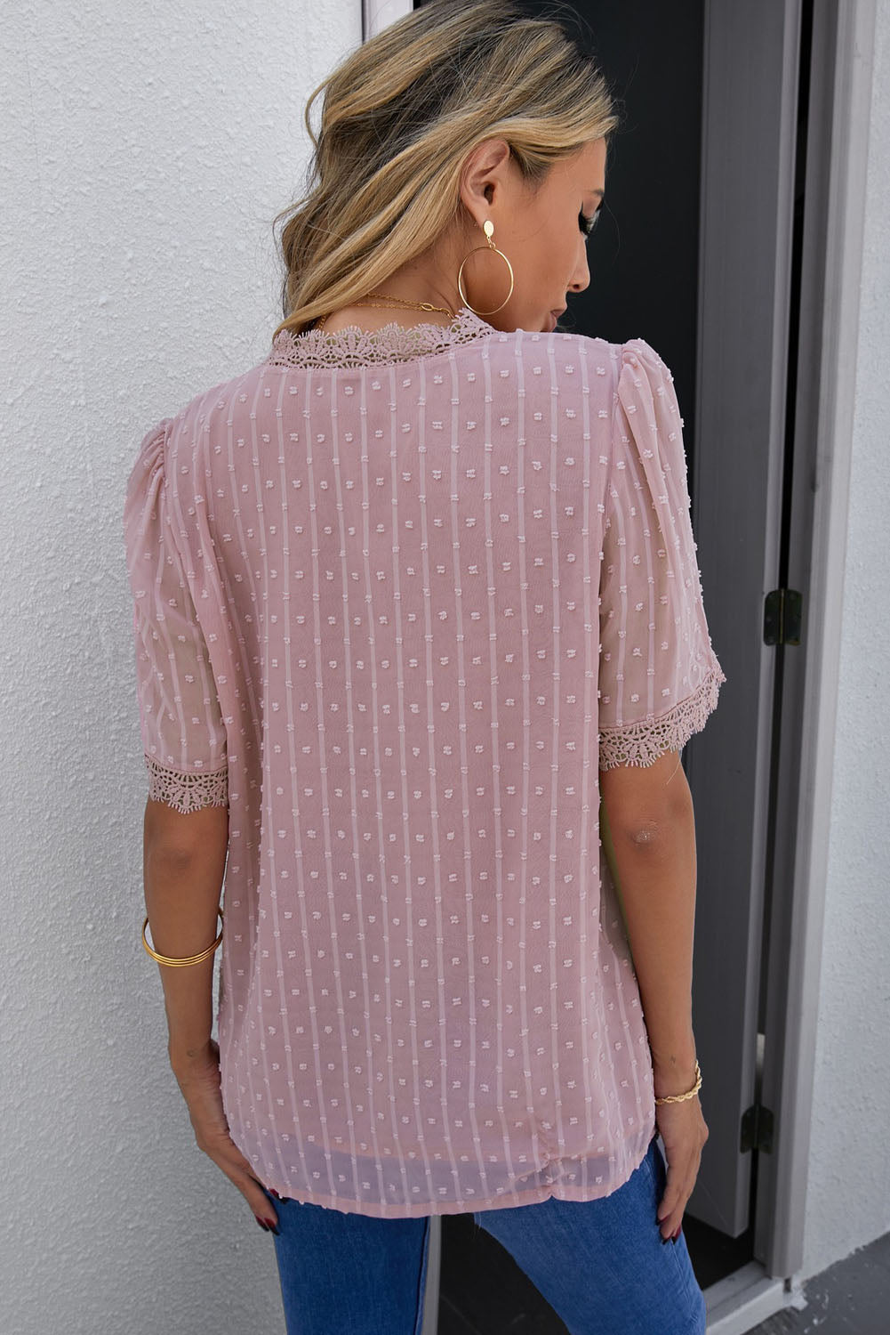 A stylish Pink Lace Splicing V-Neck Swiss Dot Short Sleeve Top featuring lace trim and a deep V-neck design, perfect for casual and formal occasions.