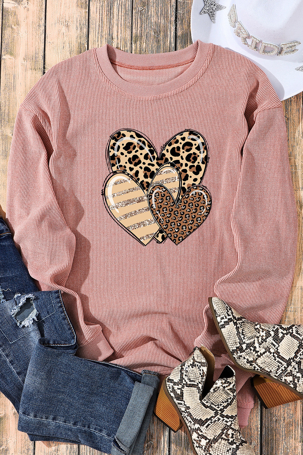 Pink Leopard Heart Shape Corded Loose Fit Sweatshirt displayed on a mannequin, showcasing its trendy design and soft fabric.