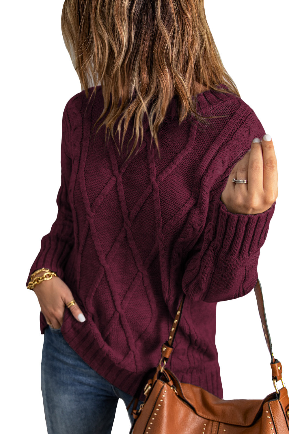 A cozy pink oversize thick pullover sweater with a cable knit design, perfect for winter wear.