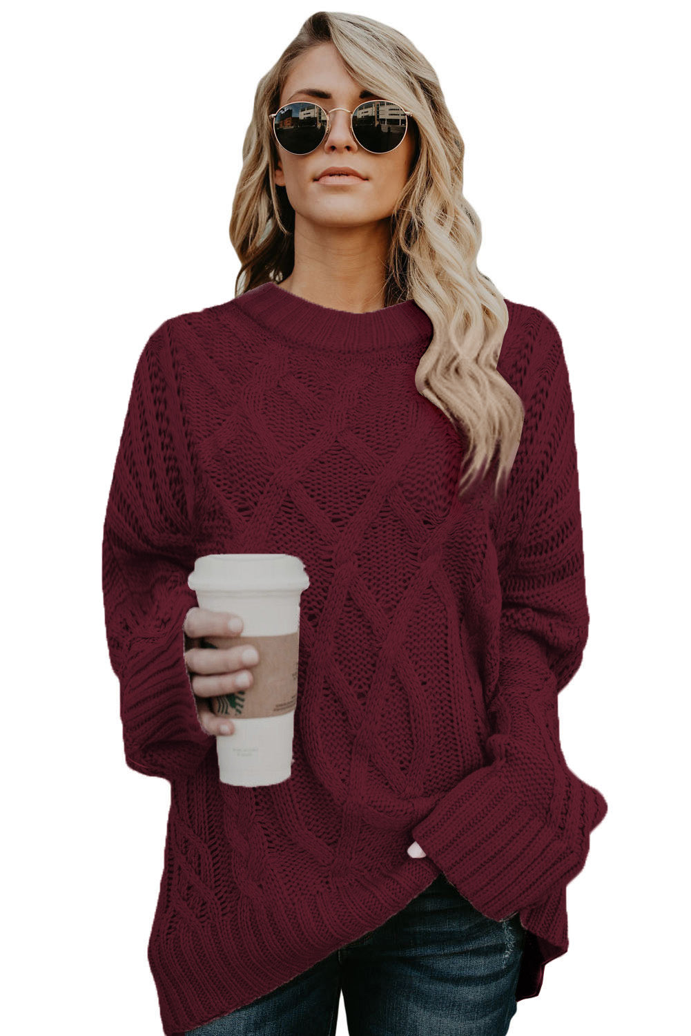 A cozy pink oversize thick pullover sweater with a cable knit design, perfect for winter wear.